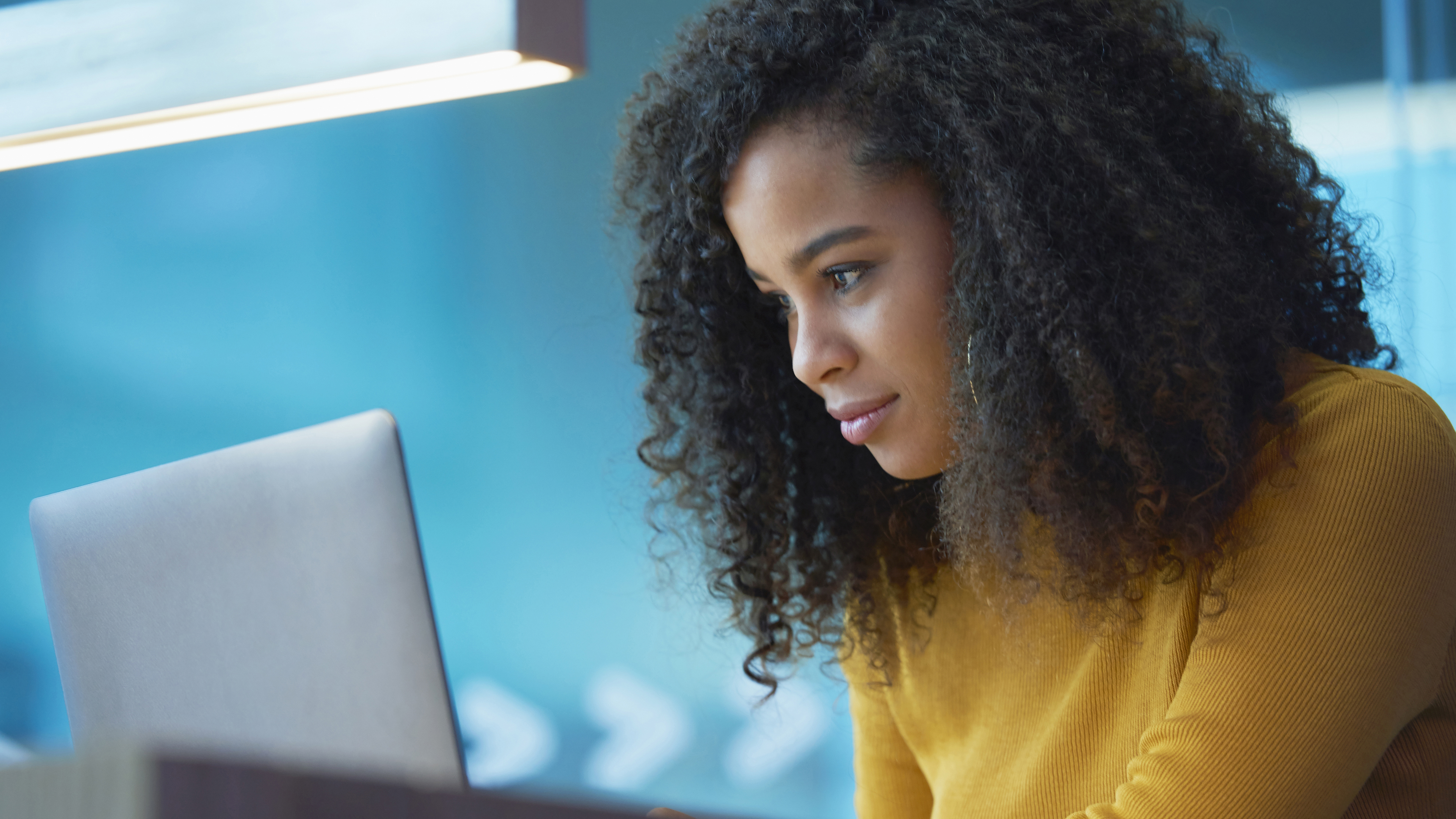 Woman working on laptop